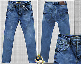 Джинси чоловічі завужені слім блакитного кольору з потертостями -2022