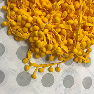 Тасьма з помпонами яскраво-жовтогарячого кольору (10 мм)