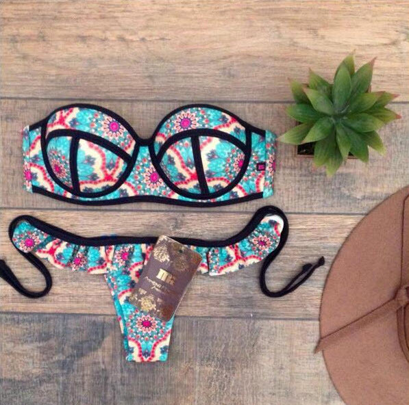 Стильні яскраві купальники Triangl