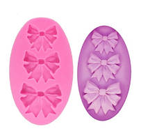 Молд силіконовий Бантики 50 на 87 мм рожевий