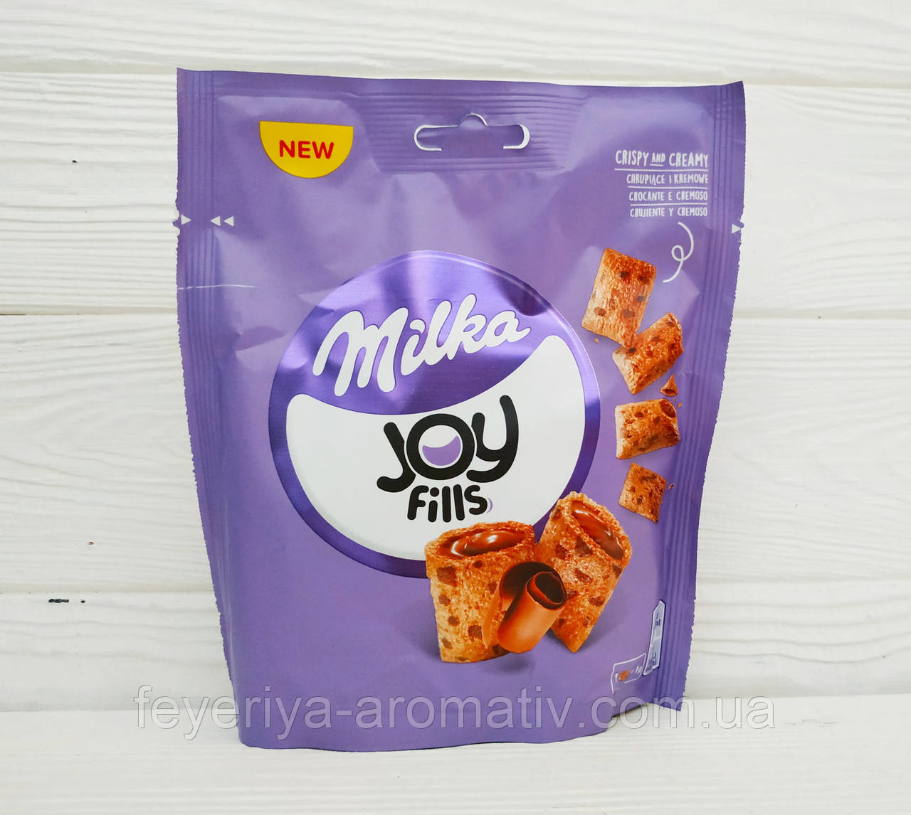 Злакові подушечки з шоколадною начинкою Milka Joy fills 75g (Швейцарія)