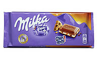 Молочный шоколад с кусочками печенья Milka Шоколад Chips Ahoy 100 г.