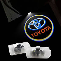 Подсветка с логотипом в двери авто Toyota.