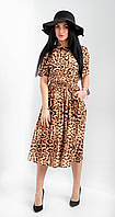 Женское нарядное платье в леопардовый принт .