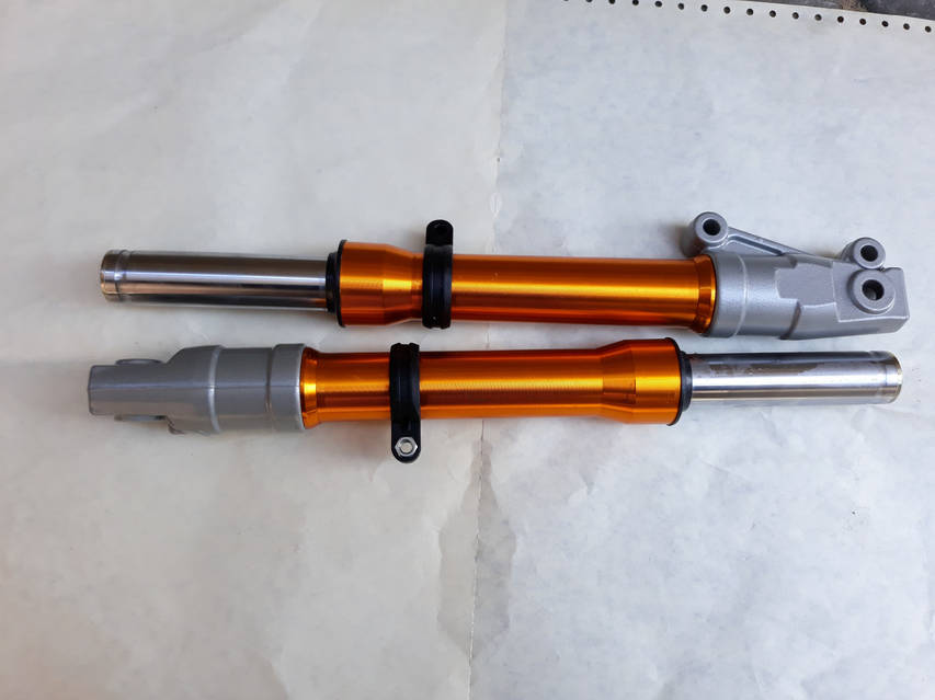 Амортизатори передні (пер'я) ZX-диск, гідравлічні, золотисті шток