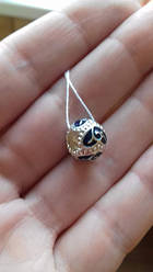 Срібний шарм з емаллю