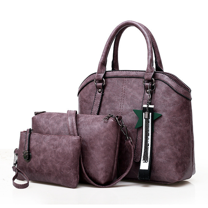 Стильна жіноча сумка в наборі 3в1 фіолетового кольору опт