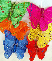 Метелики декоративні з натурального пір'я 8 см із присипкою
