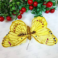 Метелики декоративні з натурального пір'я 12 см із присипкою