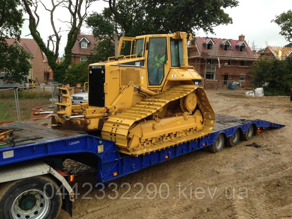 Вуслуги тралу для перевезення техніки в Україні