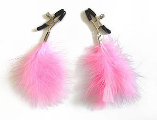 Затискачі для сосків