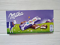 Шоколад с молочной начинкой Milka Milkinis 87,5гр (Швейцария)