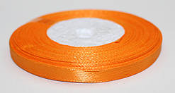 Стрічка атласна. Колір - помаранчевий. Ширина - 0,6 см, довжина - 23 м