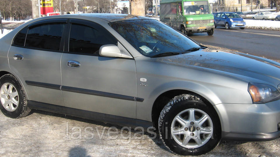 Дефлектори вікон (вітровики) Chevrolet Evanda 2000- (Autoclover/Корея)