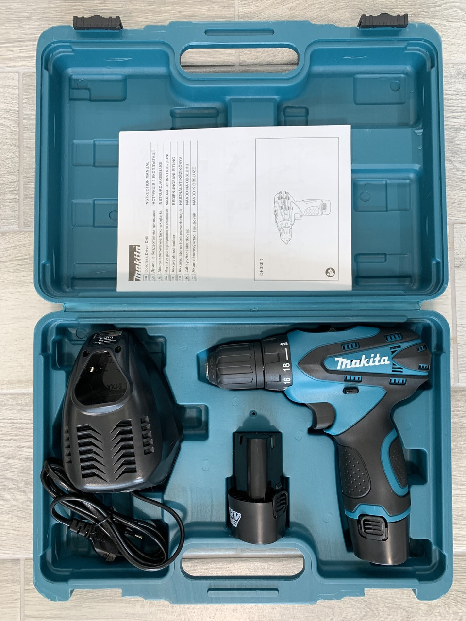 Шуруповерт Makita DF330DWE :12V Li-ion/2 шт. (заводська збірка) Румунія