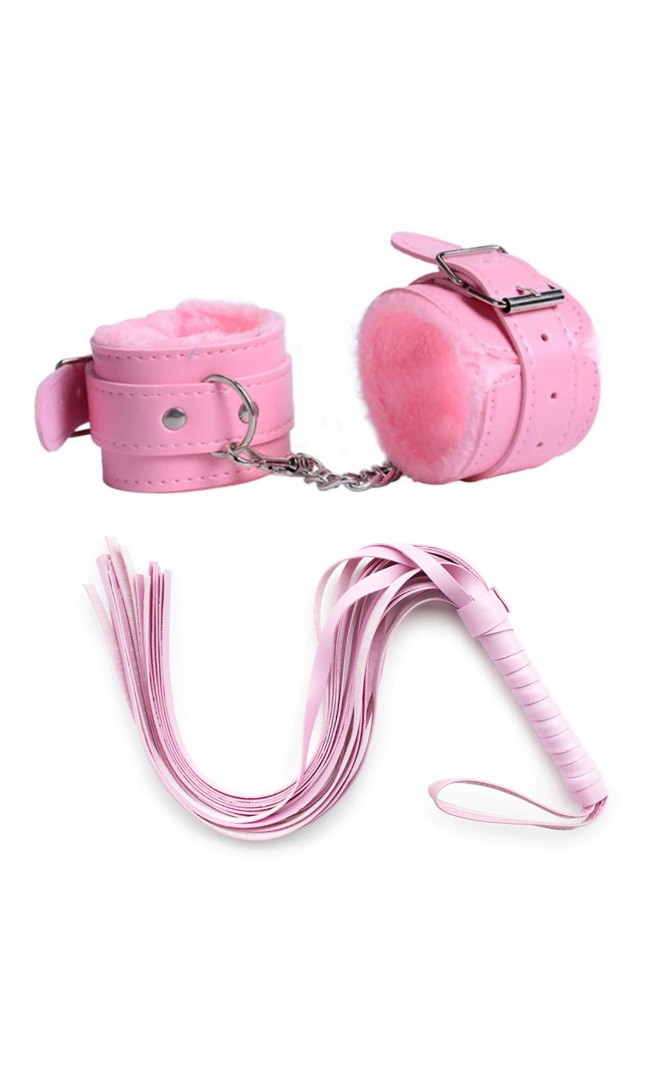Рожевий набір для ігор БДСМ наручники та плетка А-1137