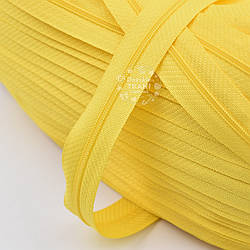 Блискавка рулонна жовтого кольору, Т3 (метражем)