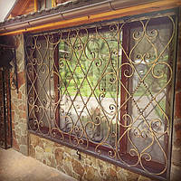 Кованые решетки ручной работы на окна и двери 2