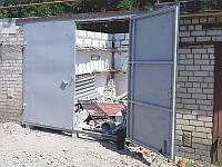Ворота гаражные 3х2,5 м металл 2,0 мм в рамке
