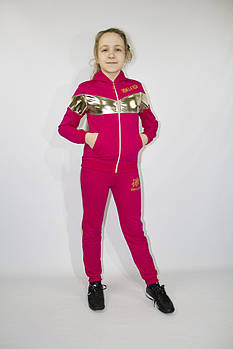 Спортивний трикотажний костюм для дівчинки зі вставкою золото, в наявності лише 122 зріст