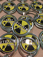 "Брелоки з логотипами: Маленькі аксесуари, великий вплив"