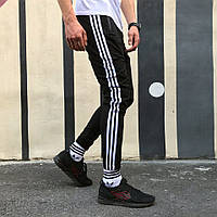 Спортивные штаны Adidas Strips черные