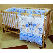 Комплект постільної білизни та приладдя в дитяче ліжечко