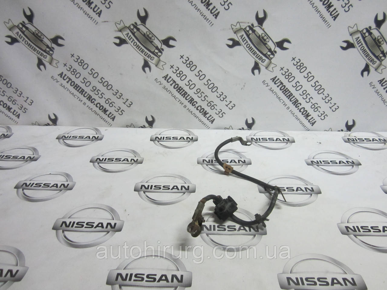 Мінусова клема акумулятора Nissan Armada
