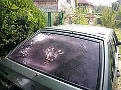 Наклейки на перфорованій плівці на заднє скло машини. Наклейка на авто вовк