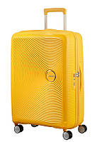 Средний пластиковый чемодан American Tourister Soundbox
