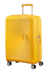 Середній пластиковий чемодан American Tourister Soundbox