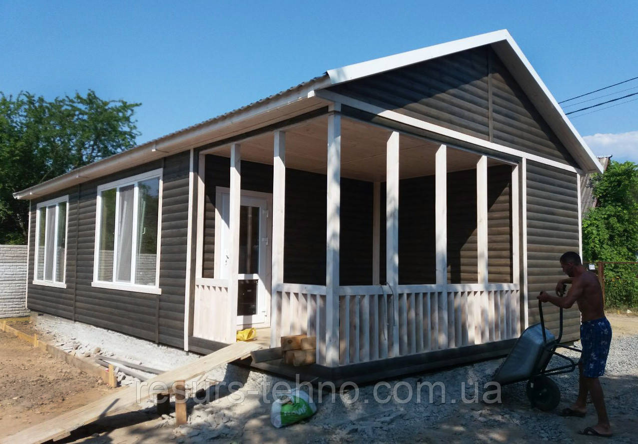 Модульний дачний будинок 6 м х 12 м із терасою Оздоблення-блокхаус.