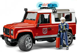 Іграшка Bruder Пожежний Land Rover Defender (світло+звук) з фігуркою пожежника 1:16 (02596)