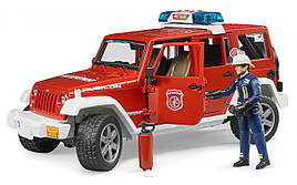 Іграшка Bruder джип Пожежний Wrangler Unlimited Rubicon з фігуркою пожежника М1:16 (02528)