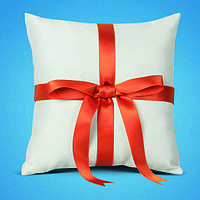 Подушечка для обручних кілець із оранжевою стрічкою