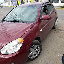 Дефлектори вікон (вітровики) Hyundai Accent/Verna 2006+/Kia Rio 4D (вставні, 4 шт.) (HEKO)