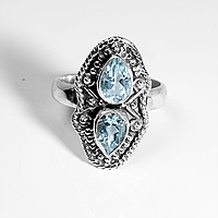 Серебряное кольцо с голубым топазом, 7*5 мм., 1099КТ