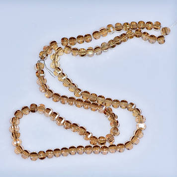 Намистини кришталеві в стилі Сваровські шампань гранений кулька d-5х4мм нитка L-48см