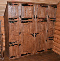 Шкаф распашной с ящиками и нишами, декорирован кованными деталями