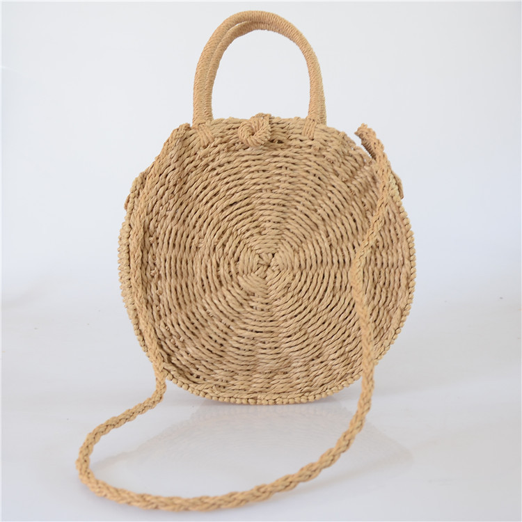 Жіноча кругла плетена сумочка коричневого кольору з ручками, фото 1