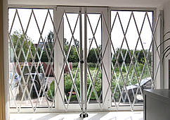 Розсувні металеві решітки на вікна