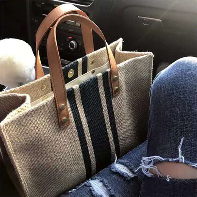 Тканинна сумка-шоппер кремового кольору з чорною смужкою