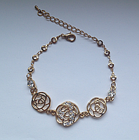 Вечерний браслет "Розы" с белыми камнями в золотом металле