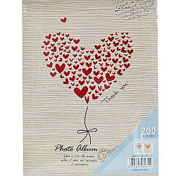 Фотоальбом "LOVE - серце" 200/10х15см. (Місце для запису, подарункова коробка)