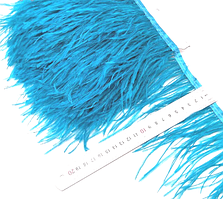 Пір'яна тасьма страусина. Колір Бірюзово-блакитний. Перо 10-15см.Ціна за 0,5 м.