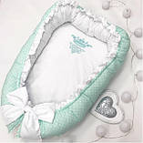 Дитячі кокони / позиціонери