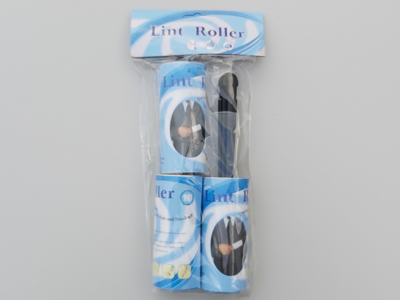 Ролик-липучка для чищення одягу на 10 аркушів з двома змінними касетами, чорного кольору.