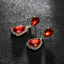 Сережки з камінням red gold
