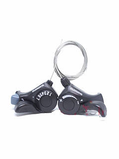 Монетки на велосипед. Shimano sl tx30. 3 на 7. Шіфтери для велосипедів. Перемикач швидкостей на велосипеді.