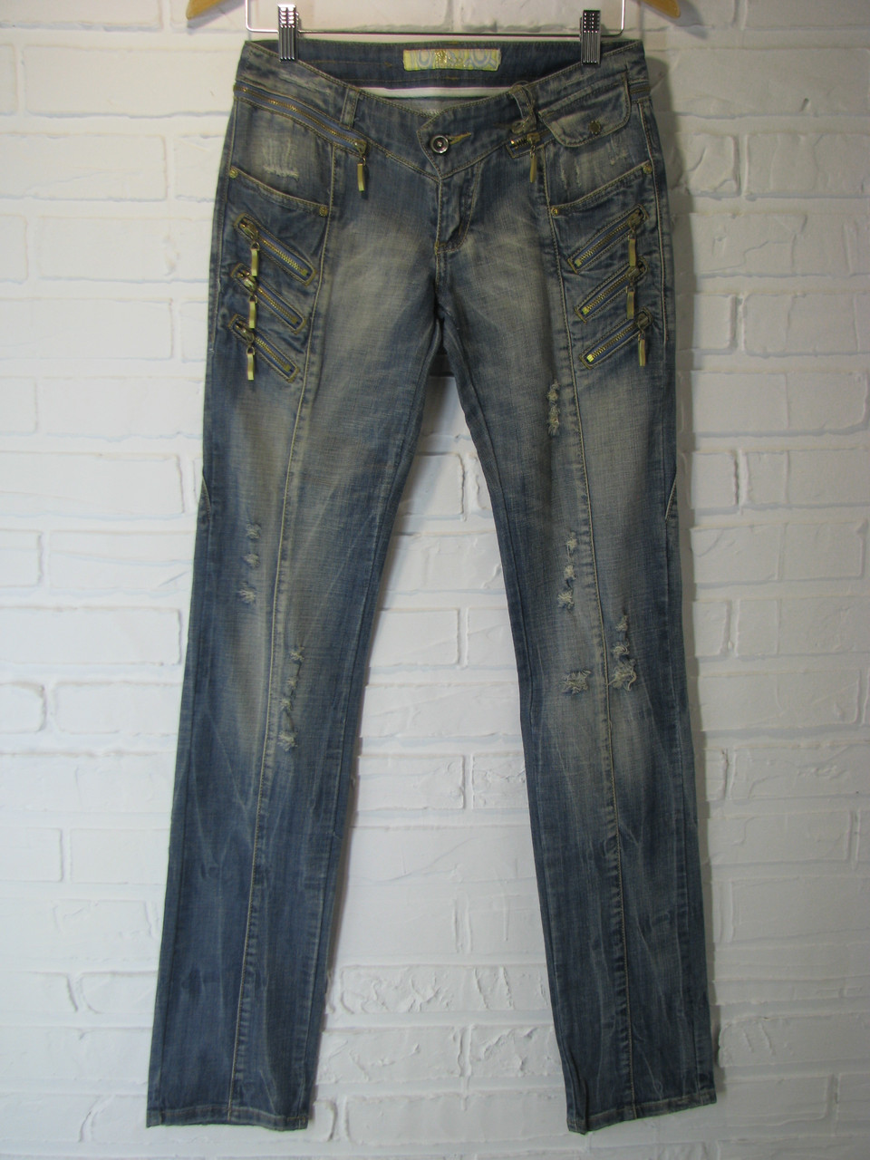 Джинси жіночі 6816 світло-сині рвані 27